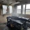A garage damaged from soot damage and smoke damage.